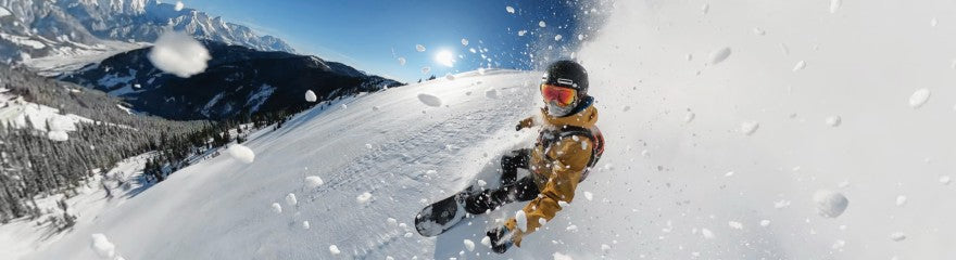 Action cam buying guide - snowboarder on a mountain slope
