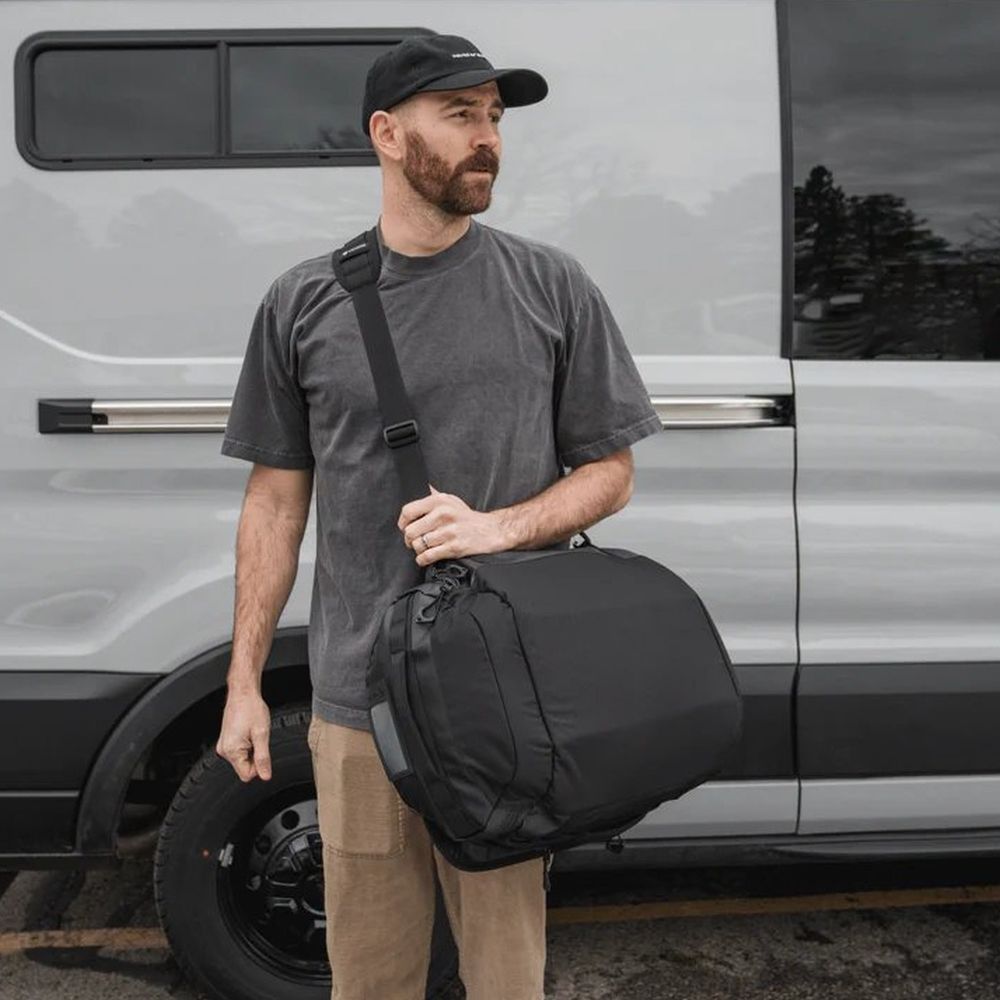 WANDRD CARRYALL Duffel Schultergurt schwarz