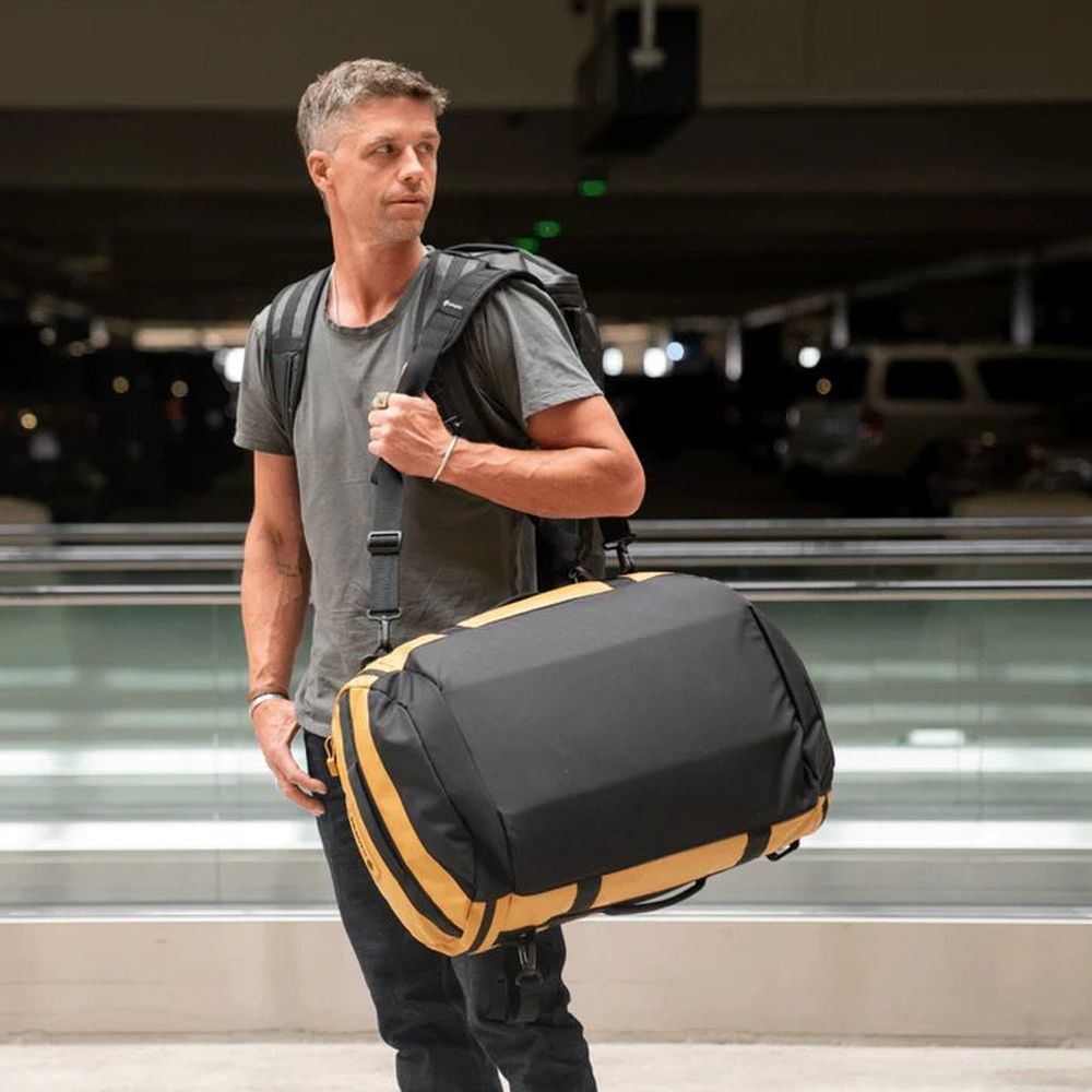WANDRD CARRYALL Duffel Schultergurt schwarz