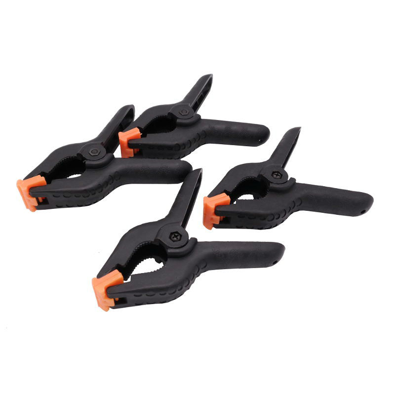 Caruba Hintergrundklemme Schwarz/Orange Groß (4 Stück)